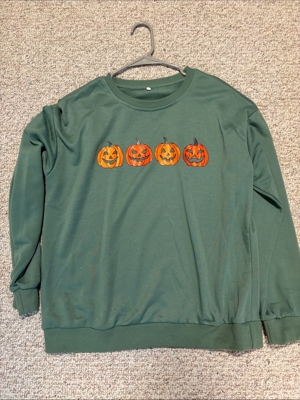 Green Sweatshirt with Pumpkin Jack-O'-Lanterns